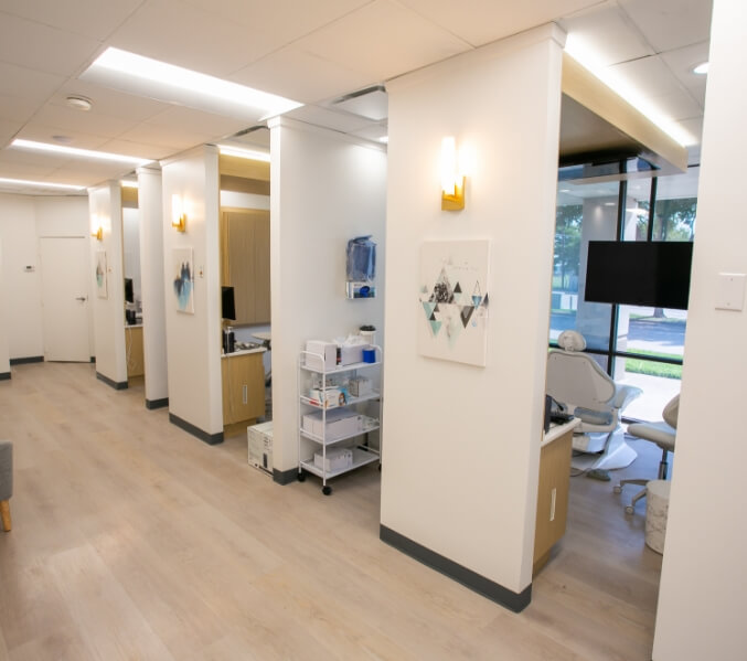 Long hallway leading to dental treatment rooms