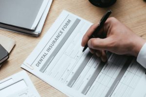 dental insurance form on table